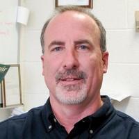 Greg M. Swain