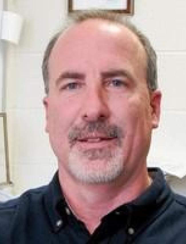 Greg M. Swain